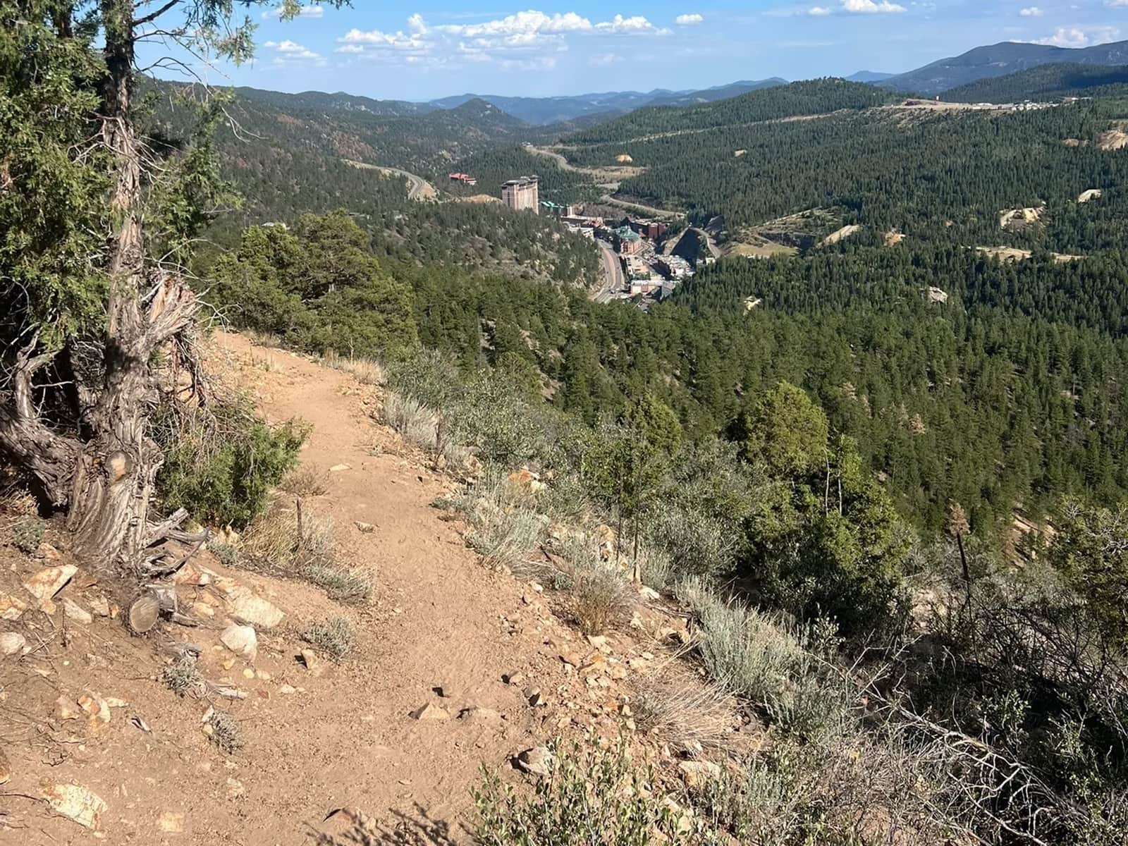 A hiking trail overlooking the mountains near Central City